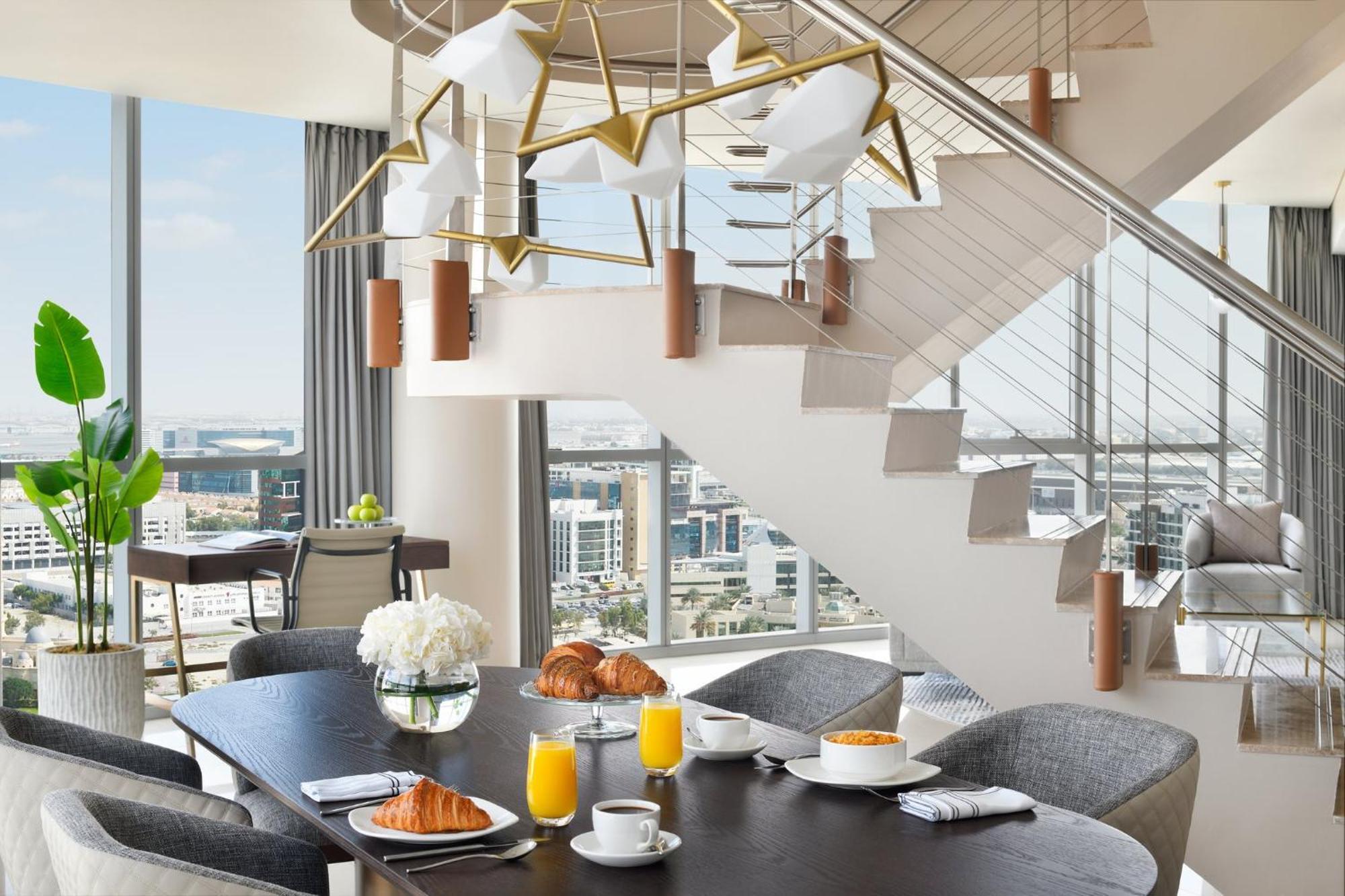 Intercontinental Residence Suites Dubai Festival City By Ihg Bagian luar foto A breakfast table at the Waldorf Astoria Chengdu